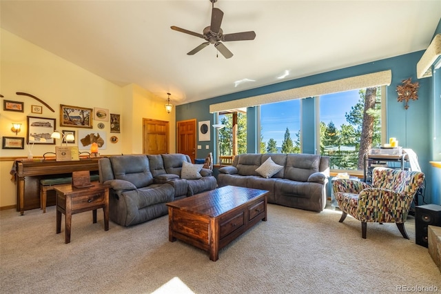 6752 S Columbine Rd, Evergreen, CO 80439 - living area featuring carpet floors, lofted ceiling, healthy amount of natural light, and ceiling fan