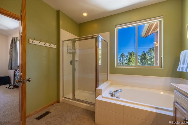 6752 S Columbine Rd, Evergreen, CO 80439 - bathroom with a stall shower and a garden tub