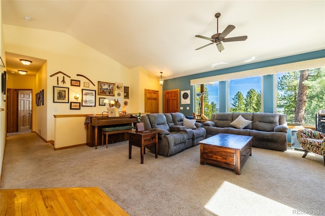 6752 S Columbine Rd, Evergreen, CO 80439 - living room with lofted ceiling, light carpet, and ceiling fan