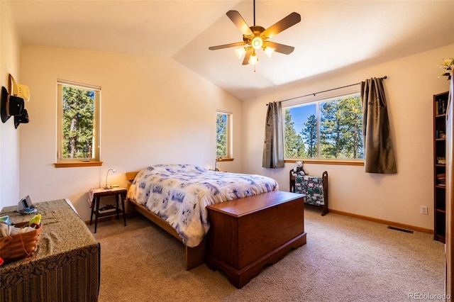 6752 S Columbine Rd, Evergreen, CO 80439 - bedroom with vaulted ceiling, light carpet, and ceiling fan