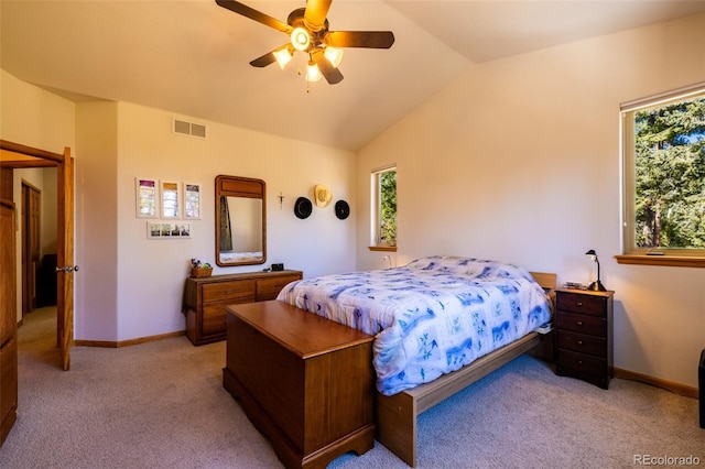 6752 S Columbine Rd, Evergreen, CO 80439 - bedroom with light carpet, lofted ceiling, and a ceiling fan