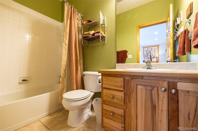 6752 S Columbine Rd, Evergreen, CO 80439 - full bathroom with tile patterned floors, shower / tub combo with curtain, vanity, and a textured wall