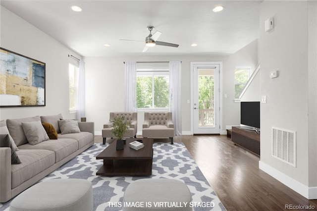 12714 E Dickenson Ave, Aurora, CO 80014 - living area with wood finished floors, ceiling fan, and recessed lighting