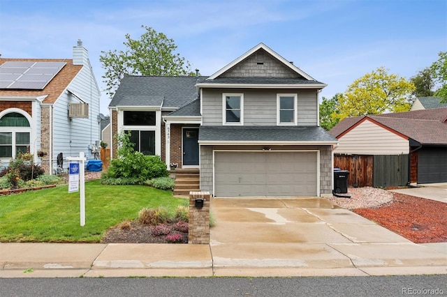 6342 Marshall St, Arvada, CO 80003 - view of front of home with a garage, concrete driveway, and a shingled roof