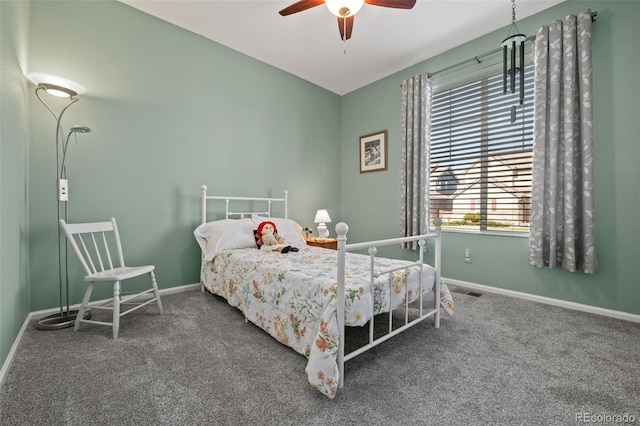 bedroom with carpet and baseboards