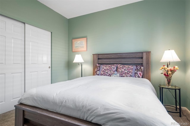 bedroom featuring a closet and carpet