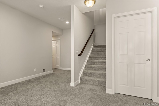 stairway featuring recessed lighting, baseboards, and carpet floors
