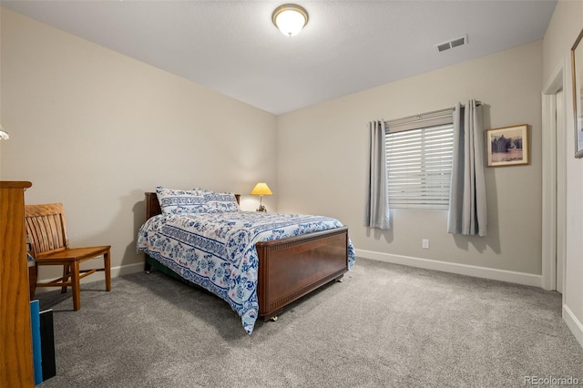bedroom with carpet flooring, baseboards, and visible vents