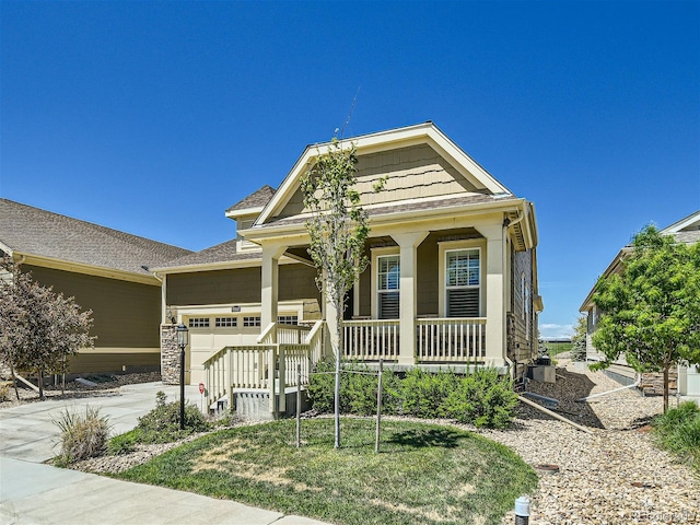 15347 Quince Cir, Thornton, CO 80602 - craftsman inspired home featuring covered porch, a garage, concrete driveway, central AC, and roof with shingles