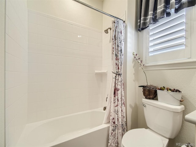 15347 Quince Cir, Thornton, CO 80602 - bathroom with toilet and shower / bathtub combination with curtain