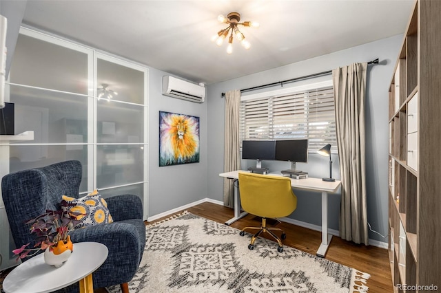 home office featuring hardwood / wood-style flooring and an AC wall unit