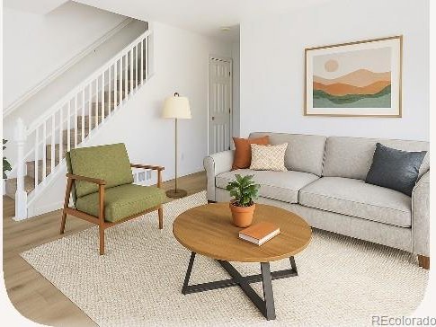 2644 Devonshire Ct, Denver, CO 80229 - living room featuring wood finished floors and stairs