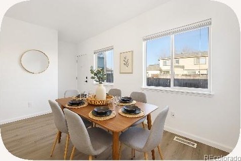 2644 Devonshire Ct, Denver, CO 80229 - dining space featuring wood finished floors