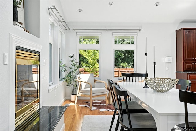3608 S Newport Way, Denver, CO 80237 - dining space with light wood-type flooring and baseboards