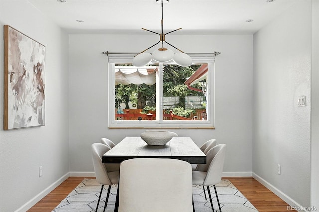 3608 S Newport Way, Denver, CO 80237 - dining area featuring wood finished floors
