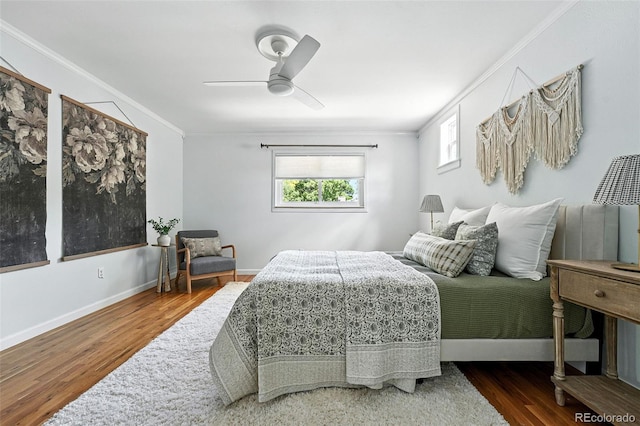 3608 S Newport Way, Denver, CO 80237 - bedroom with crown molding, wood finished floors, and a ceiling fan