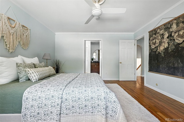 3608 S Newport Way, Denver, CO 80237 - bedroom featuring wood finished floors, ornamental molding, ceiling fan, arched walkways, and ensuite bath