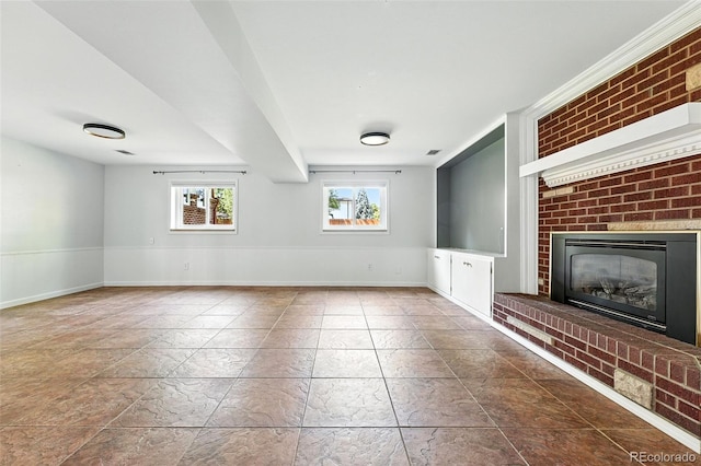 3608 S Newport Way, Denver, CO 80237 - unfurnished living room with a brick fireplace and baseboards