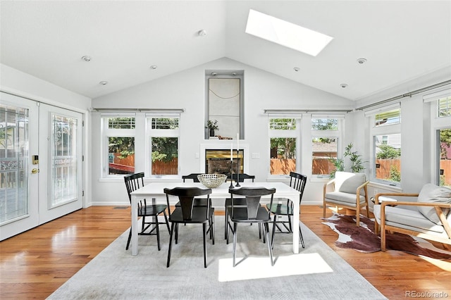 3608 S Newport Way, Denver, CO 80237 - sunroom / solarium featuring vaulted ceiling, a skylight, and french doors