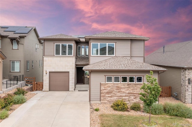 view of front of property featuring a garage