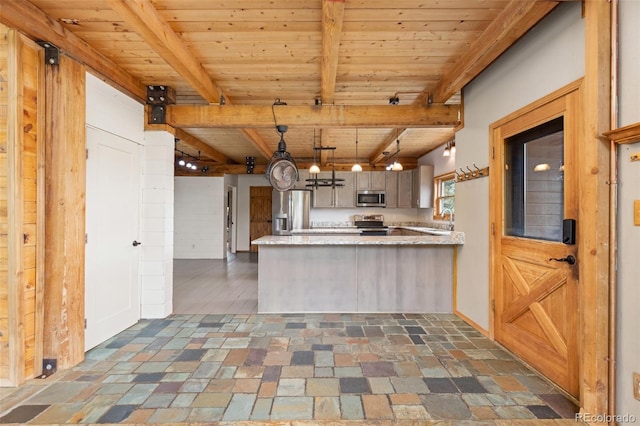 181 Sawmill Rd, Loveland, CO 80537 - kitchen with wooden ceiling with exposed beams, appliances with stainless steel finishes, a peninsula, hanging light fixtures, and stone finish flooring