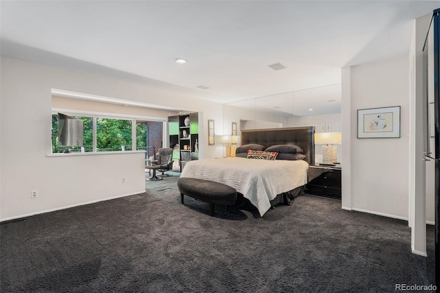 2601 S Quebec St Unit 11, Denver, CO 80231 - bedroom with carpet flooring and baseboards
