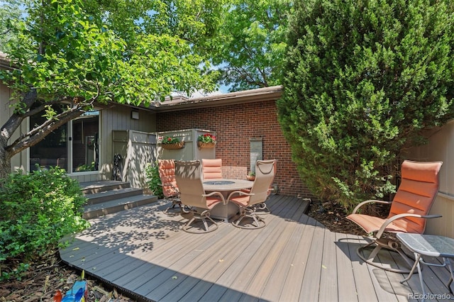 2601 S Quebec St Unit 11, Denver, CO 80231 - wooden terrace featuring entry steps and outdoor dining space