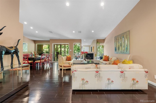 2601 S Quebec St Unit 11, Denver, CO 80231 - living room featuring healthy amount of natural light, wood tiled floors, and recessed lighting