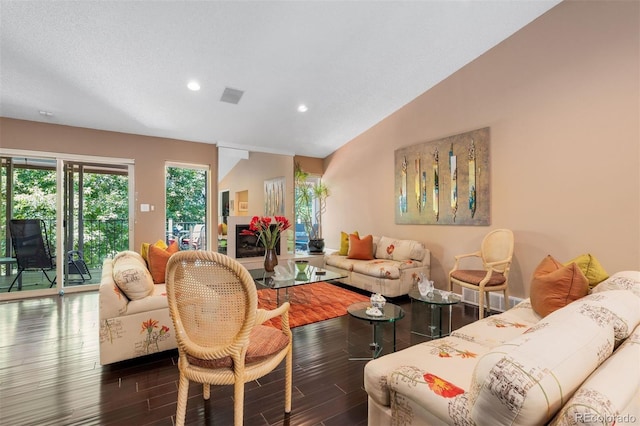 2601 S Quebec St Unit 11, Denver, CO 80231 - living area featuring wood finished floors, recessed lighting, and lofted ceiling
