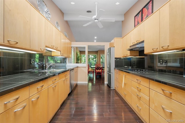 2601 S Quebec St Unit 11, Denver, CO 80231 - kitchen featuring a ceiling fan, light brown cabinets, dark countertops, lofted ceiling, and recessed lighting