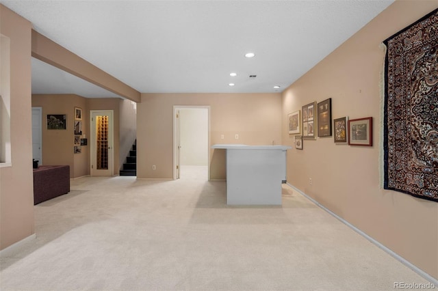 2601 S Quebec St Unit 11, Denver, CO 80231 - interior space with stairs, light colored carpet, and recessed lighting