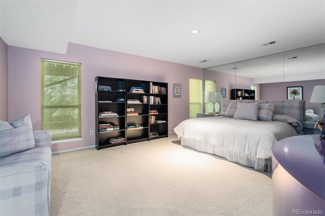 2601 S Quebec St Unit 11, Denver, CO 80231 - carpeted bedroom featuring baseboards and recessed lighting