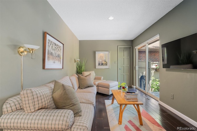 2601 S Quebec St Unit 11, Denver, CO 80231 - living room with plenty of natural light, wood finished floors, recessed lighting, and a textured ceiling