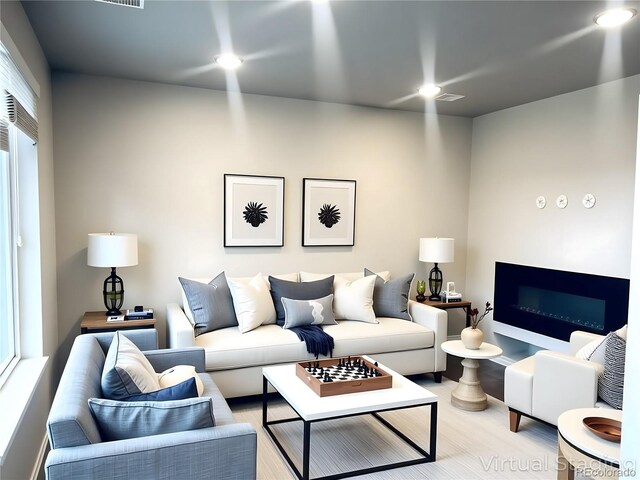14673 E Belleview Dr, Aurora, CO 80015 - living room featuring light wood finished floors