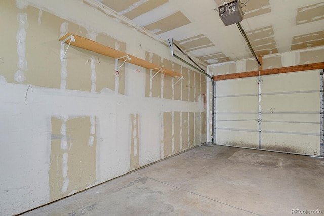12625 E Pacific Cir Unit E, Aurora, CO 80014 - garage featuring a garage door opener