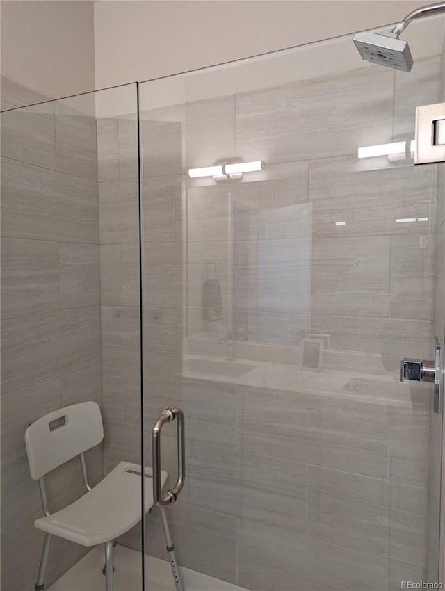 full bathroom featuring a stall shower