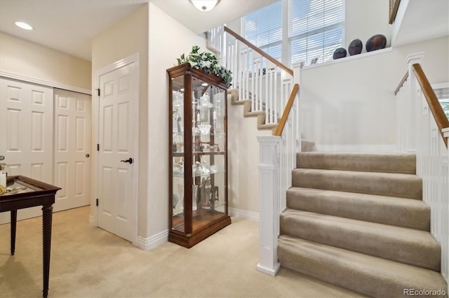 24422 E Frost Dr, Aurora, CO 80016 - staircase with carpet and baseboards