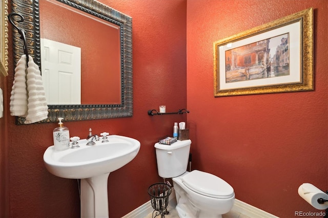 24422 E Frost Dr, Aurora, CO 80016 - half bathroom with a textured wall