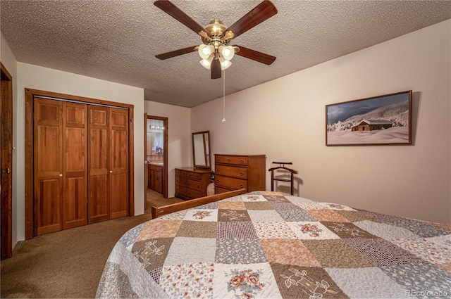 bedroom with a closet, a textured ceiling, dark colored carpet, and ceiling fan