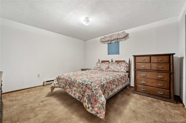 carpeted bedroom featuring a baseboard radiator and a textured ceiling