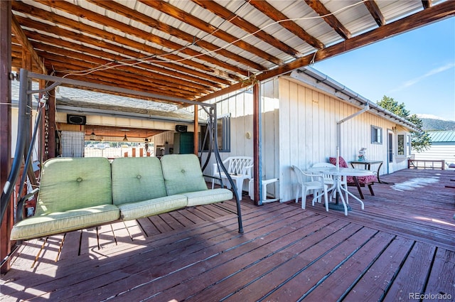 wooden deck featuring outdoor lounge area