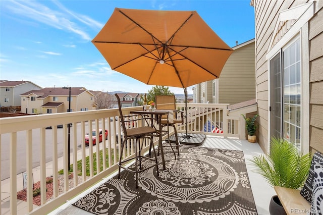 balcony featuring a residential view