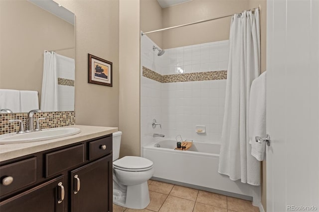 8272 E 55th Pl, Denver, CO 80238 - bathroom featuring shower / bathtub combination with curtain, vanity, tile patterned flooring, and decorative backsplash