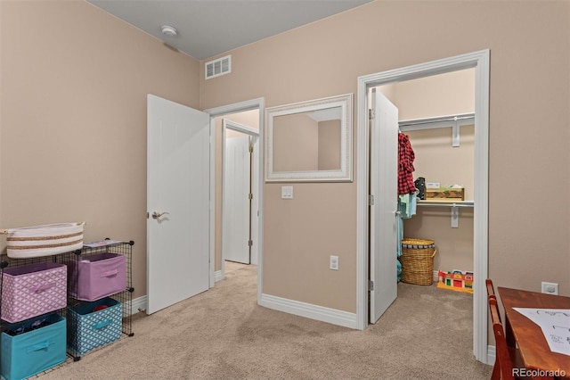 8272 E 55th Pl, Denver, CO 80238 - carpeted bedroom with a spacious closet and baseboards