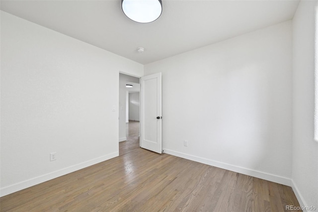 7780 Osceola St, Westminster, CO 80030 - unfurnished room featuring wood finished floors and a smoke detector