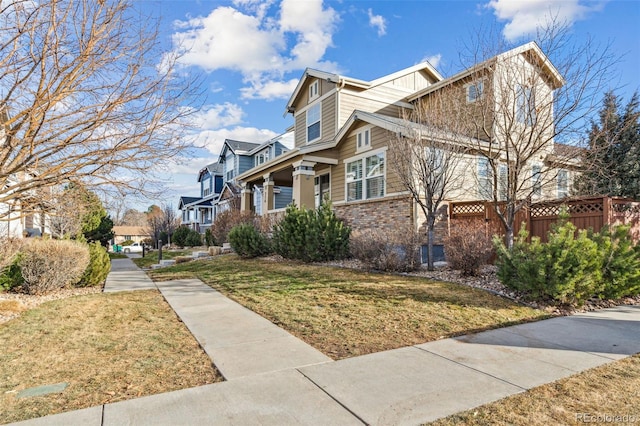 view of side of home featuring a yard