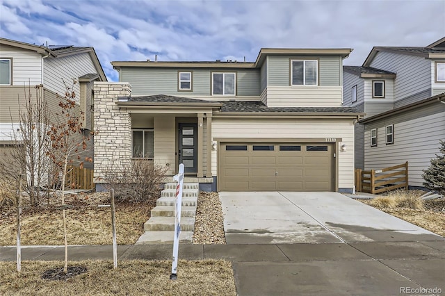 view of front of property with a garage