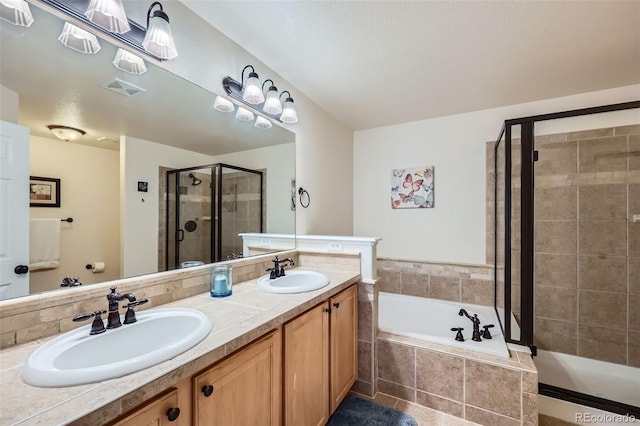 full bath with a garden tub, visible vents, a sink, and a stall shower