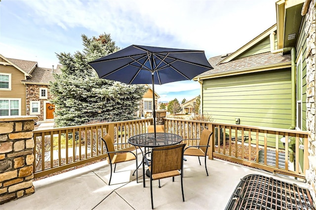 exterior space with outdoor dining space