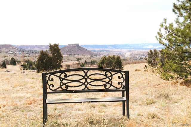 view of gate featuring a mountain view